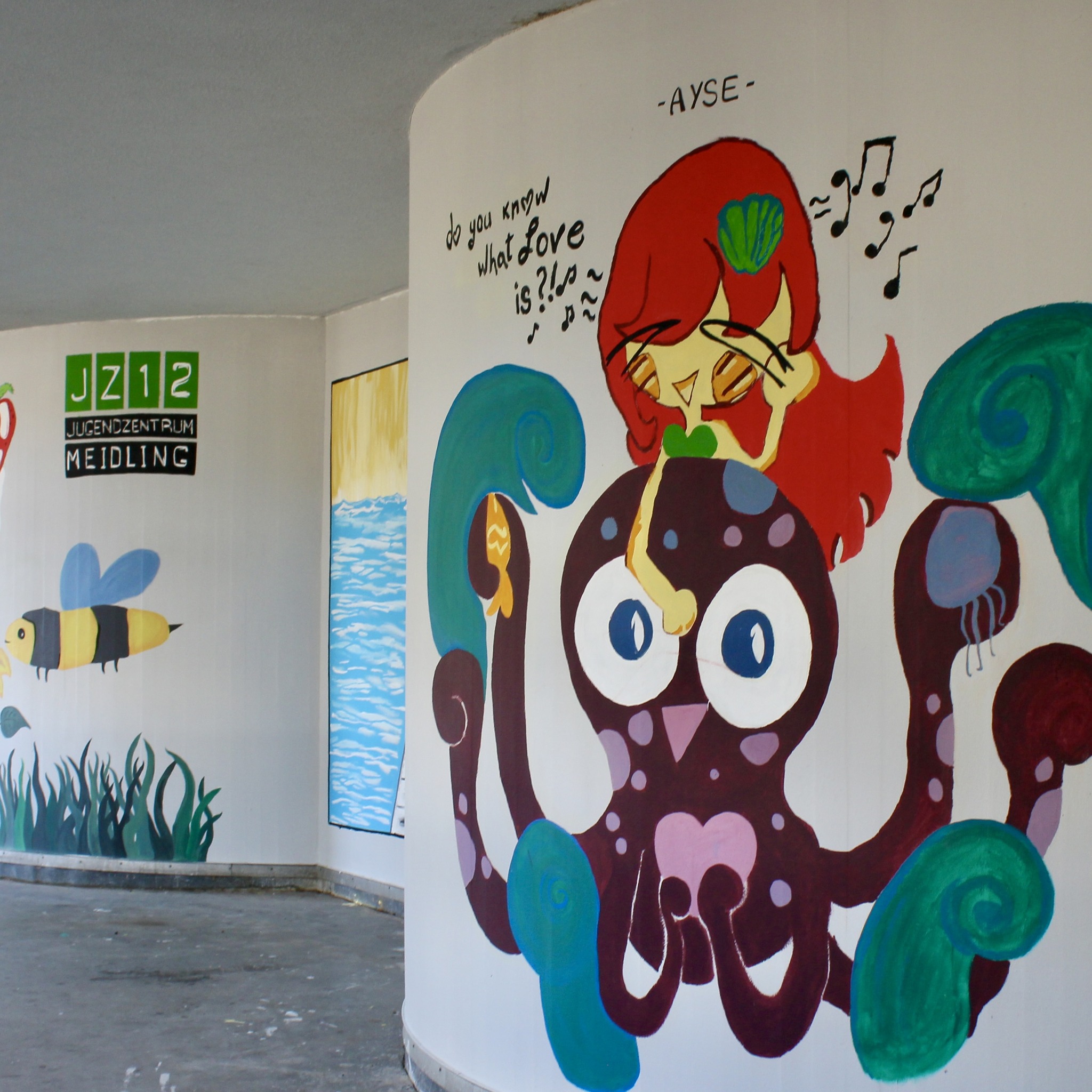 Graffiti an der Hausmauer des Jugendzentrum Meidling